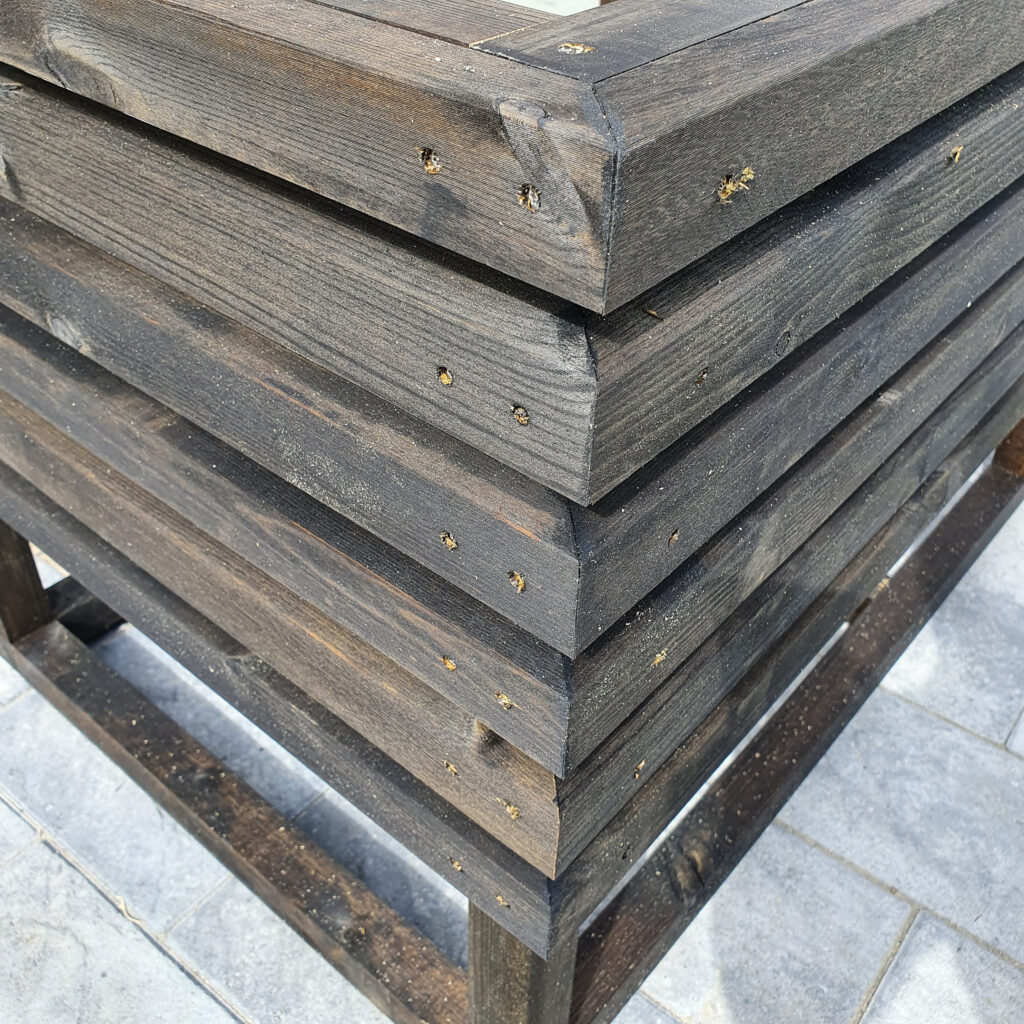 Blomsterkasse av lekter