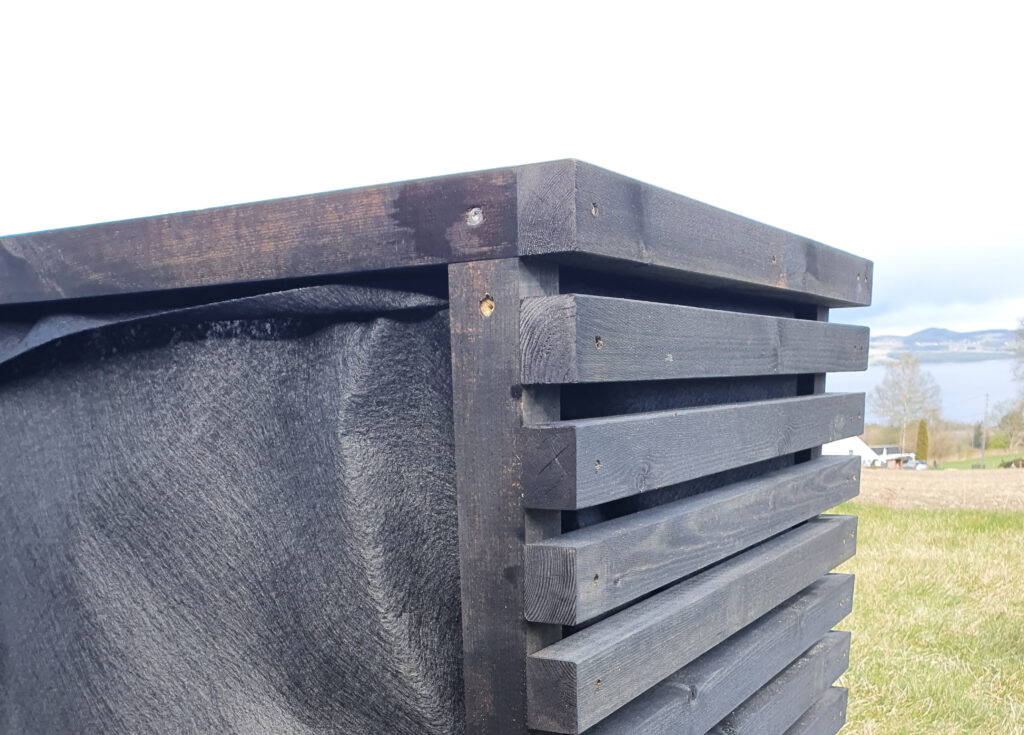 Blomsterkasse av lekter